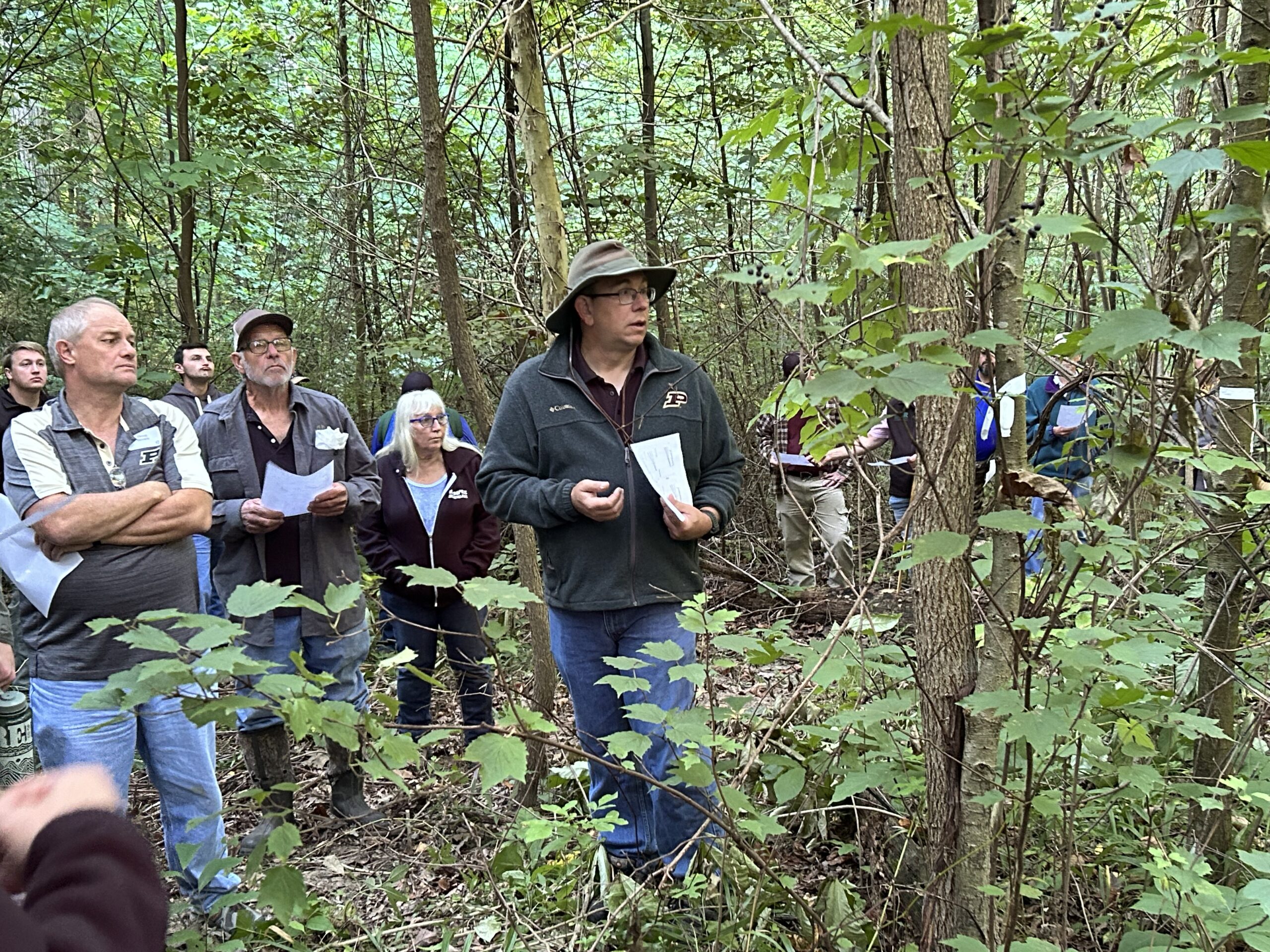 Purdue forestry professor Mike Saunders describes the establishment of the regeneration study at a past Nelson-Stokes tour.