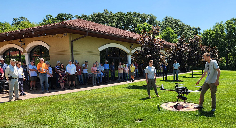 Cameron Wingren demonstrates how to use a UAV at the annual Walnut Council meeting